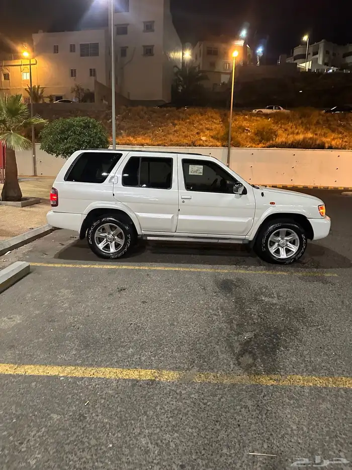 نيسان باثفندر 2005 ممشى قليل 112000 كم فل كامل أبيض لؤلؤي 1