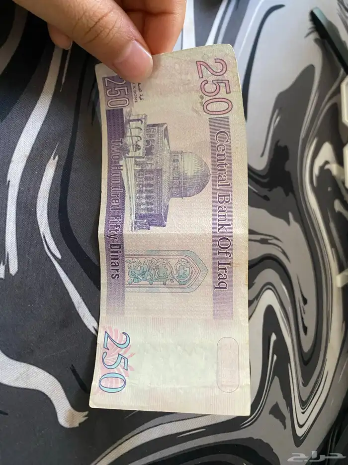 عملة صدام حسين من عام 2002 ونضيفه تتوفر كميات كبيره 1