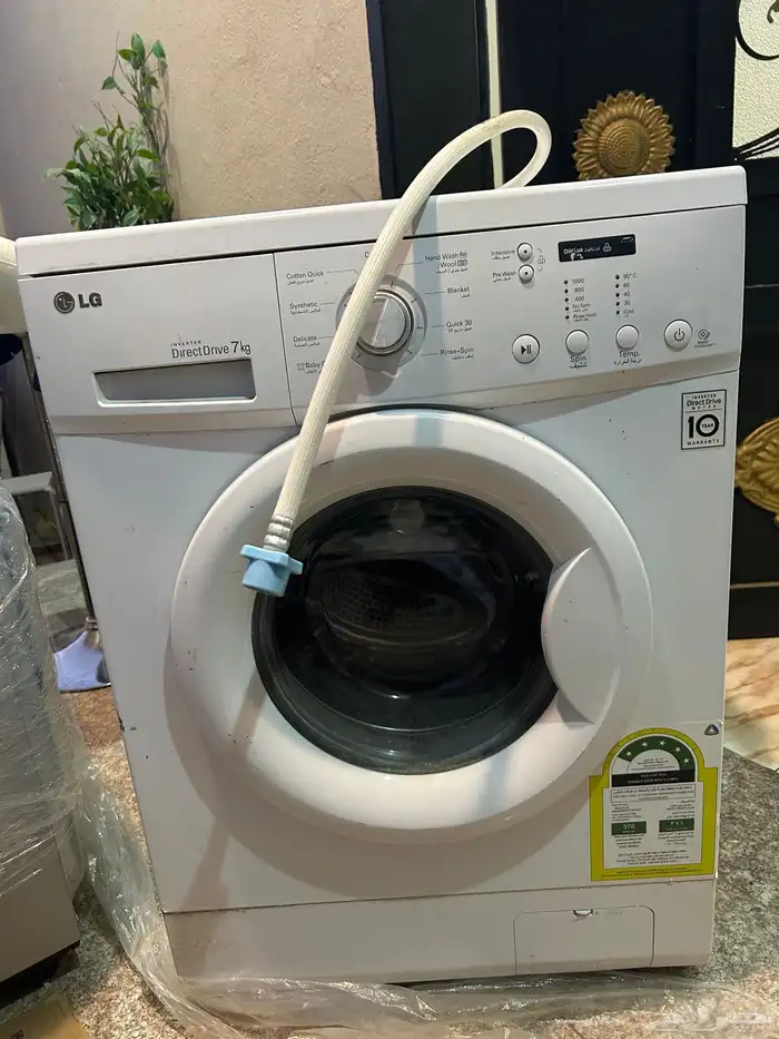 فرن وغسالة وكرسي بار وطاولة قهوة 0