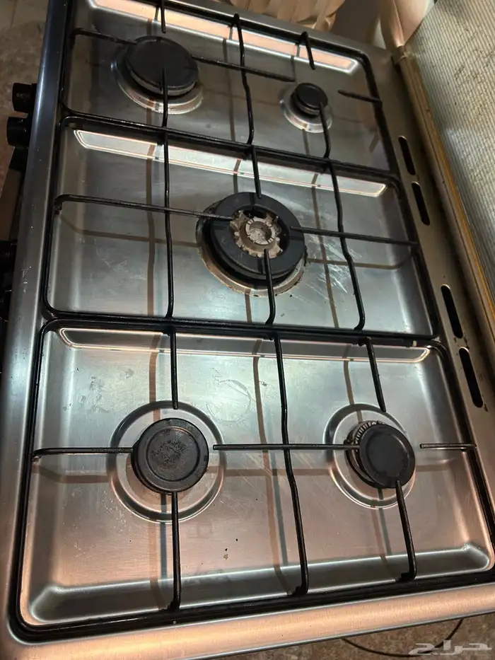 فرن وغسالة وكرسي بار وطاولة قهوة 9