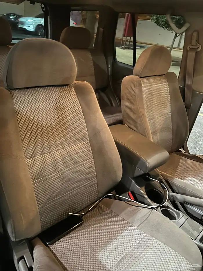 نيسان باثفندر 2005 ممشى قليل 112000 كم فل كامل أبيض لؤلؤي 25