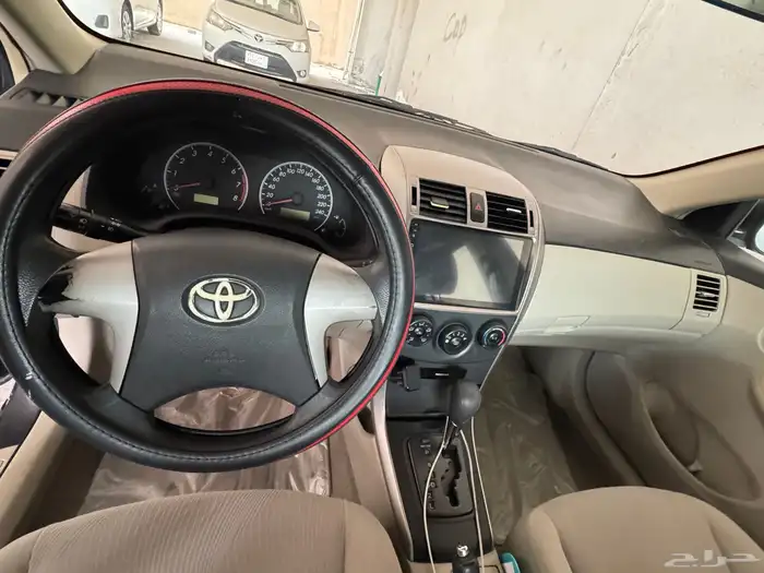 تويوتا كورلا 2013 مشى قليل جدا. 164 الف بحالة الوكالة تماما 8