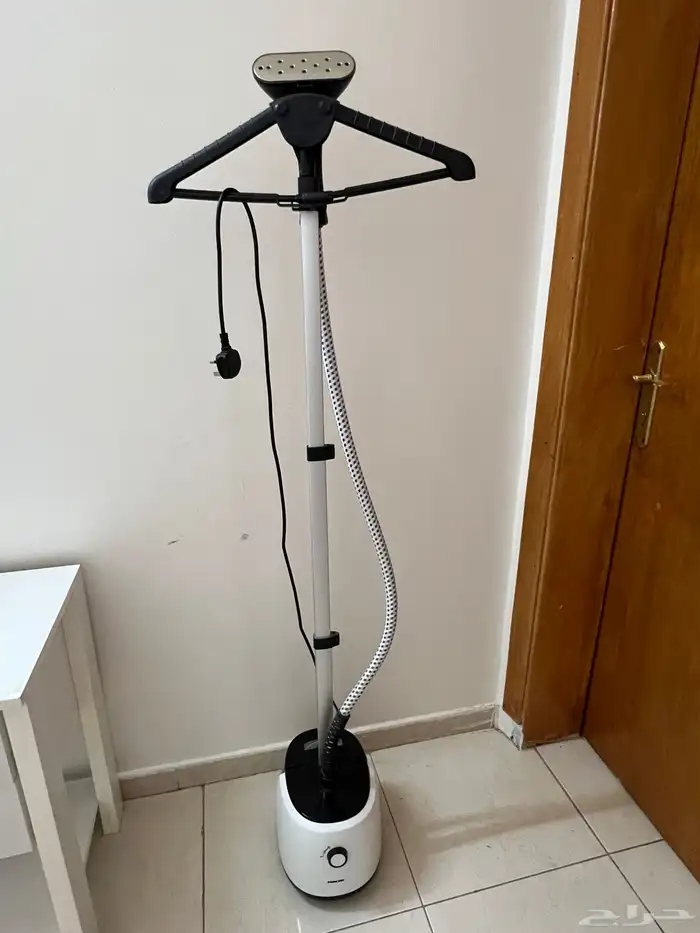 مكواة بخار للملابس 1