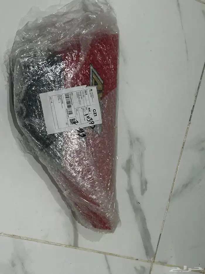 غطيان جنب دباب ax100 اصلي لون احمر 1