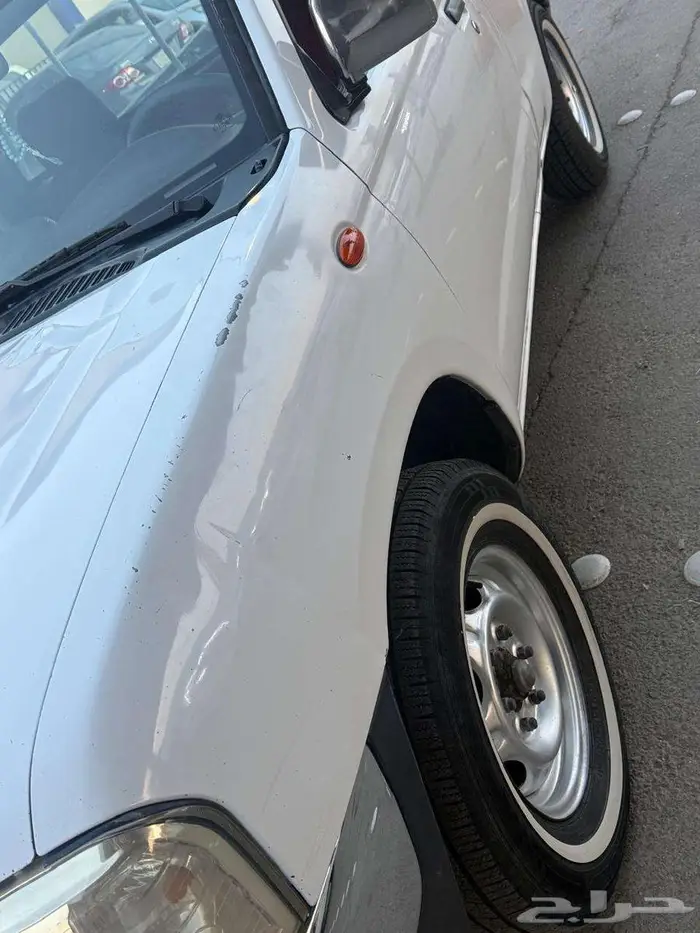 نيسان ددسن غماره 2009 بودي و محركات نظيف عداد 276 الف كم 4