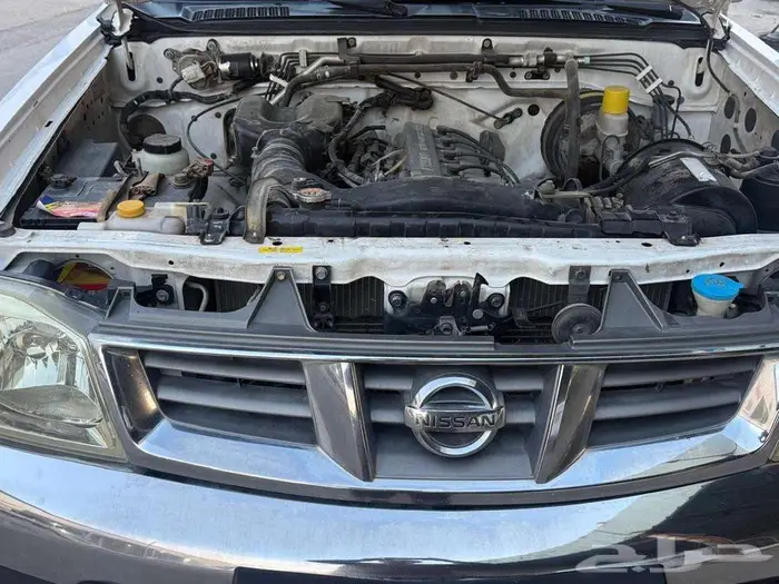 نيسان ددسن غماره 2009 بودي و محركات نظيف عداد 276 الف كم 5