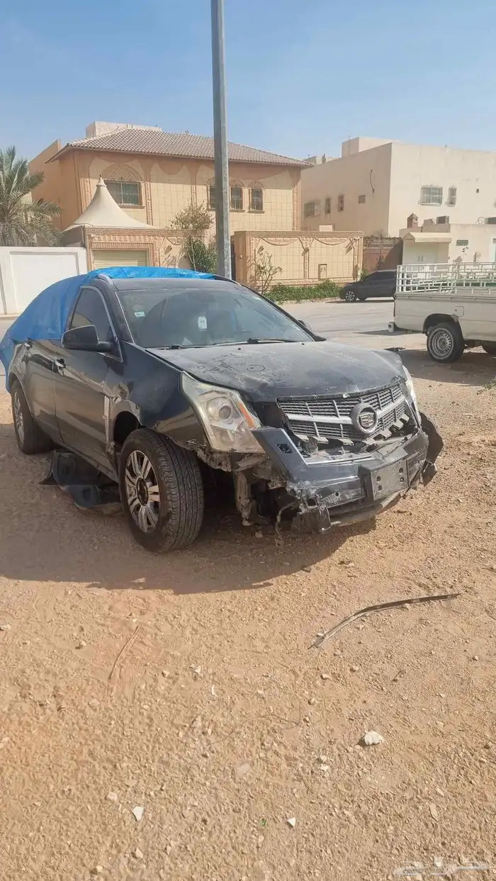 سيارة كاديلاك اس ار اكس 2012 مصدوم للبيع 4
