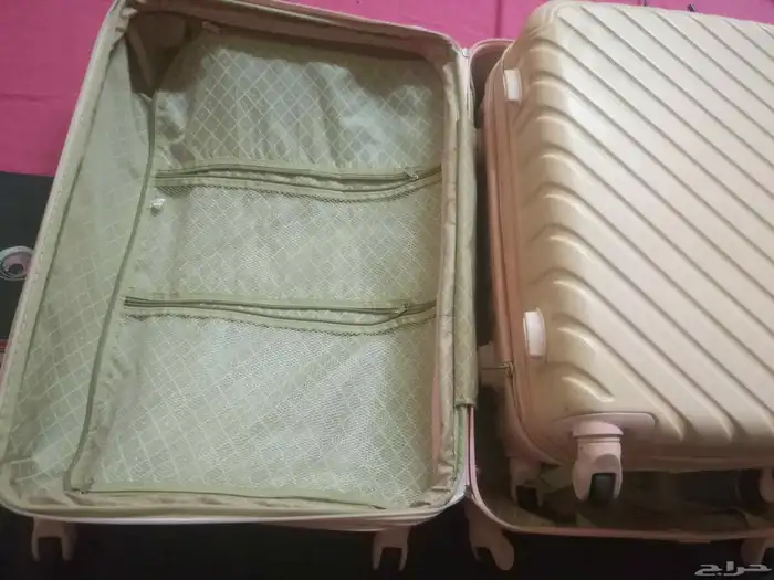 شنطتين سفر اخت الجديده وسط و صغير 3