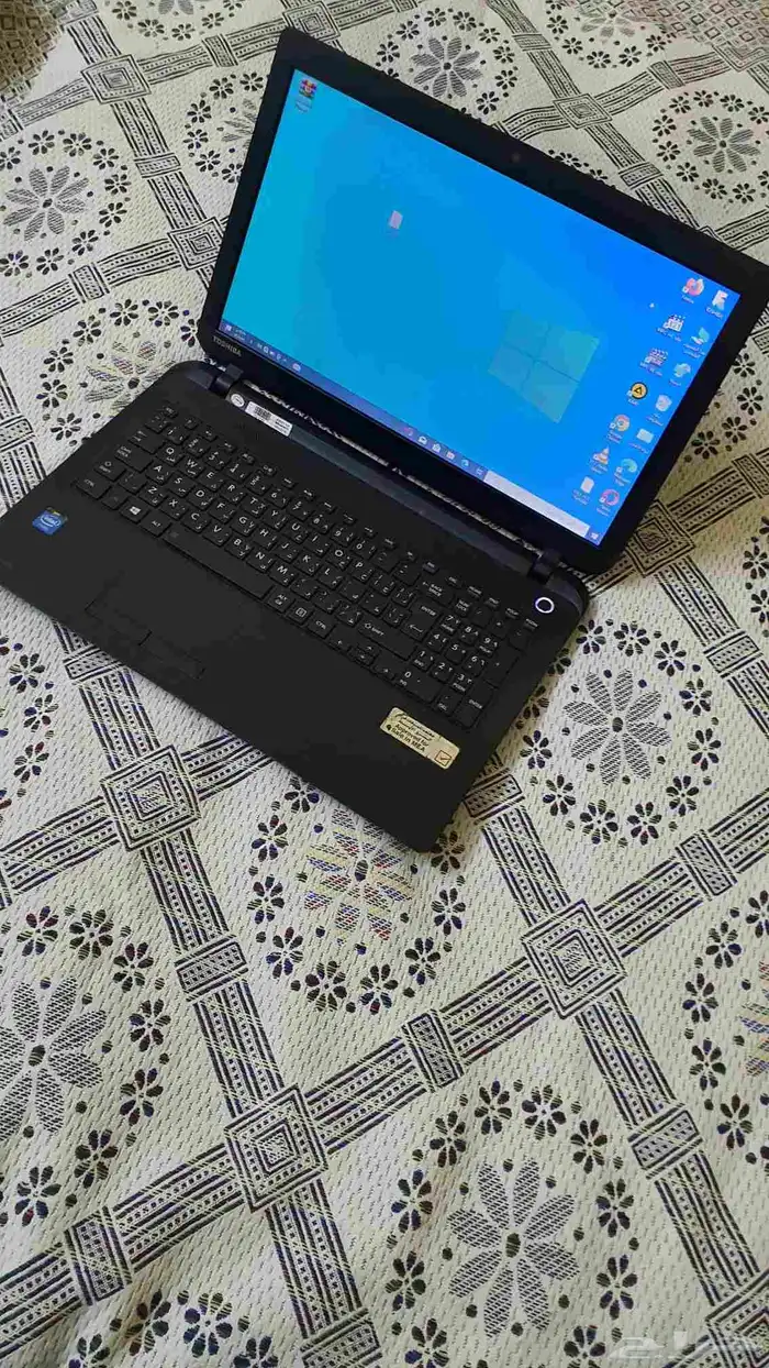 لاب توب توشيبا بمعالج سيليرون نظيف 7