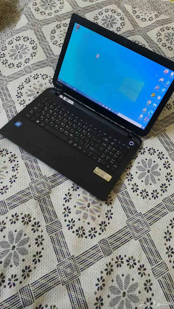 لاب توب توشيبا بمعالج سيليرون نظيف 8