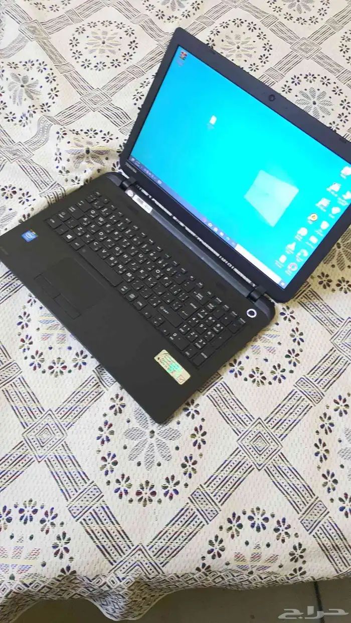 لاب توب توشيبا بمعالج سيليرون نظيف 9