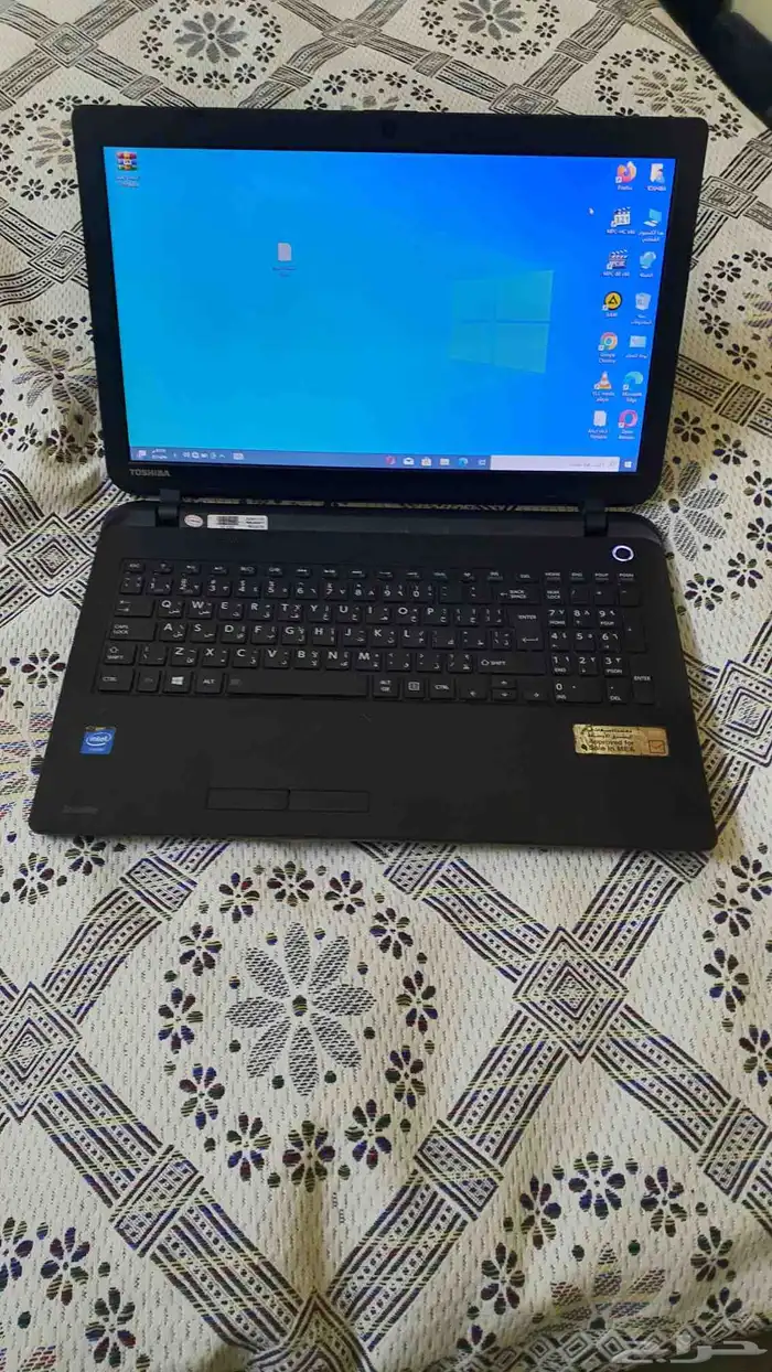 لاب توب توشيبا بمعالج سيليرون نظيف 3
