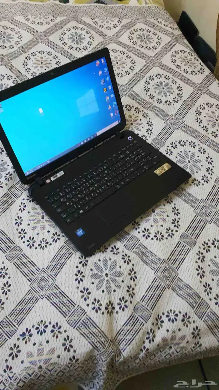 لاب توب توشيبا بمعالج سيليرون نظيف 6