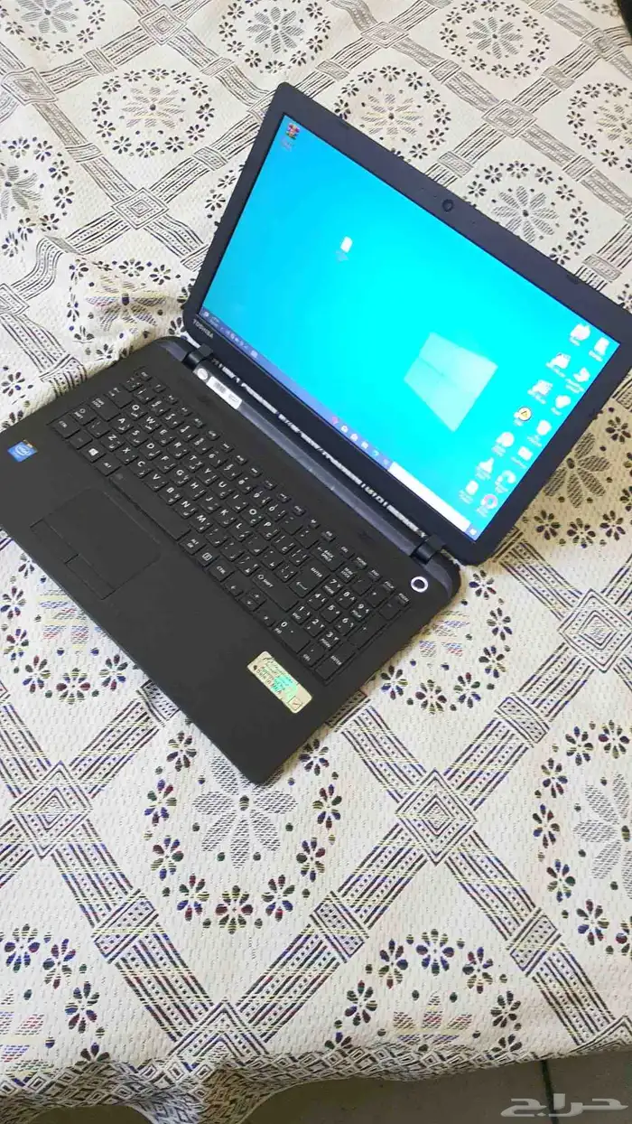 لاب توب توشيبا بمعالج سيليرون نظيف 4
