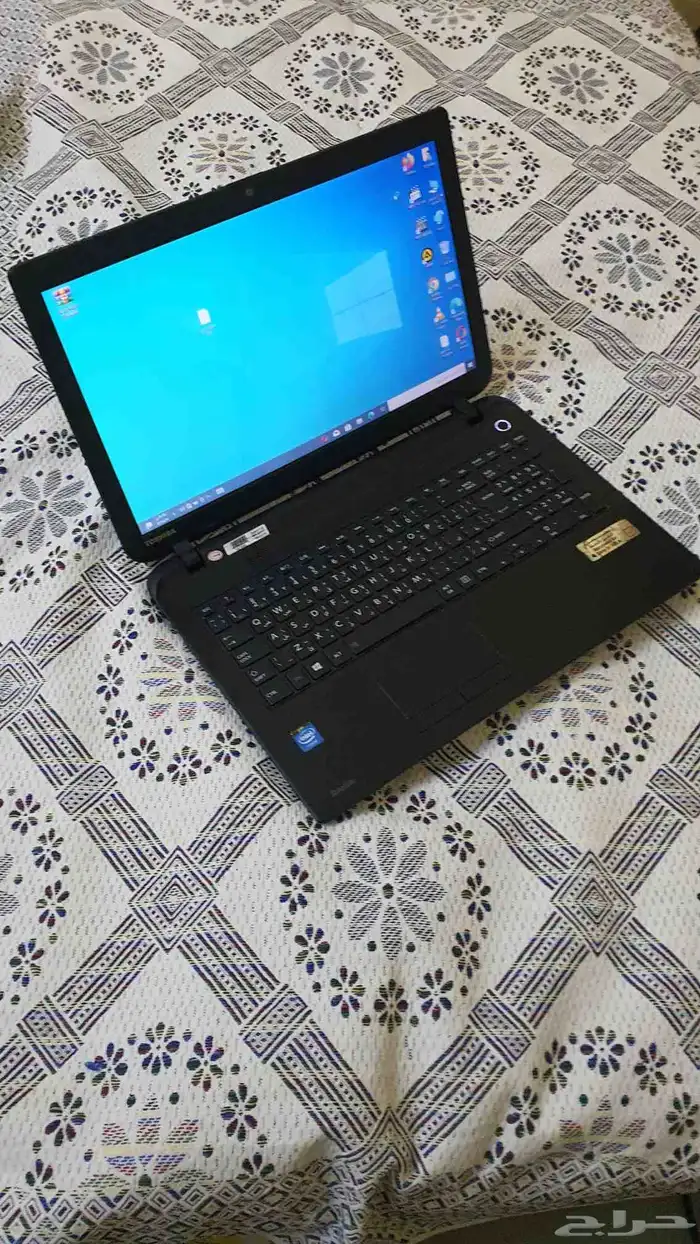 لاب توب توشيبا بمعالج سيليرون نظيف 5
