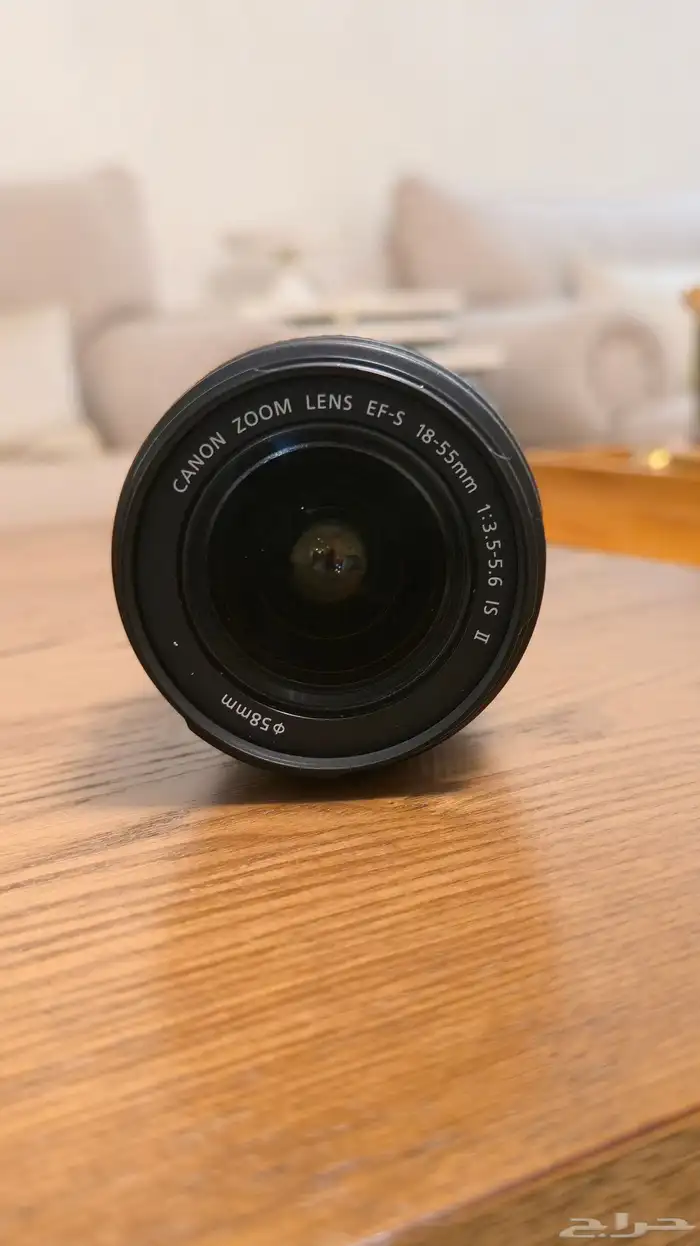 Canon EOS Rebel SL1 مع عدستها 6