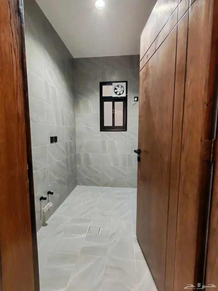 للبيع بأحد رفيده شقه دور ارضي مع حوش واسع من 550 الف 18