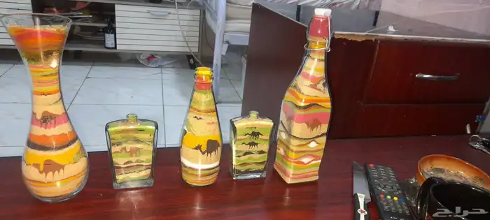 هاند ميد رسم بالرمل في زجاجه السعر بيبداء من 25ريال الي 150ر 0