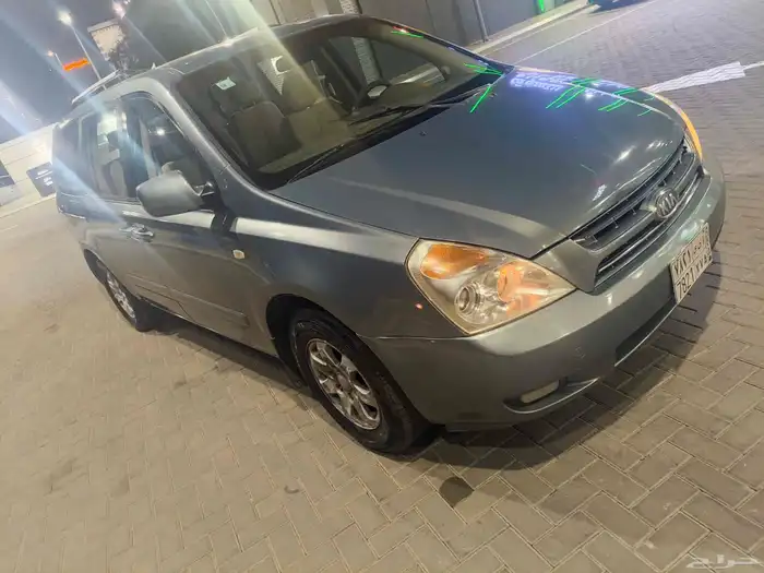 kia carnival automatic car and model.. 2009. pass new. 15000 7