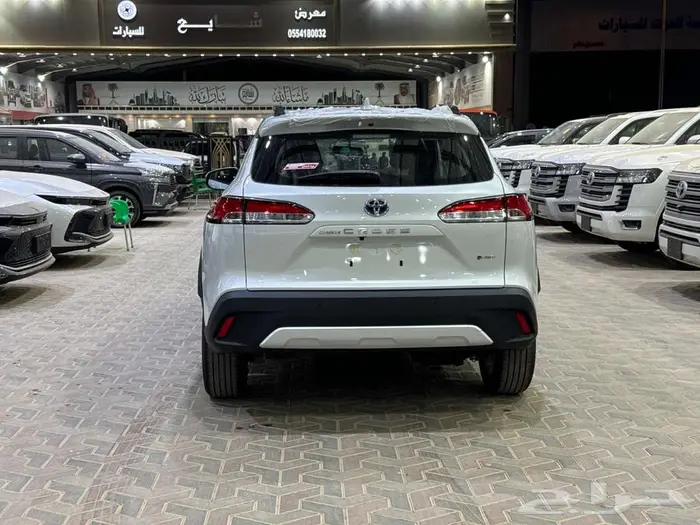 تويوتا كورولا كروس نص فل ابيض هايبرد 2025 اقل سعر كاش وبنوك 25