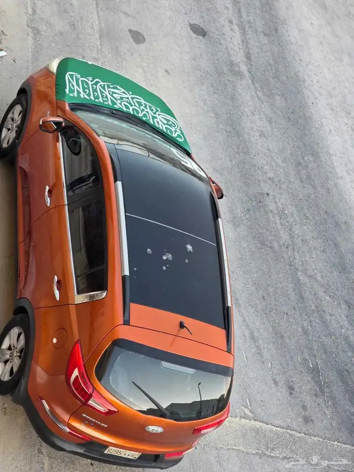 سيارة كيا سبورتاج مودل 2014 لون برتقالي ماشي 300الف فل كامل 0