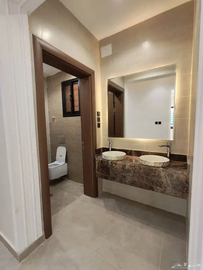 للبيع بأبها شقق تمليك علوي ب 500 الف بسطح خاص ومصعد شغال 14