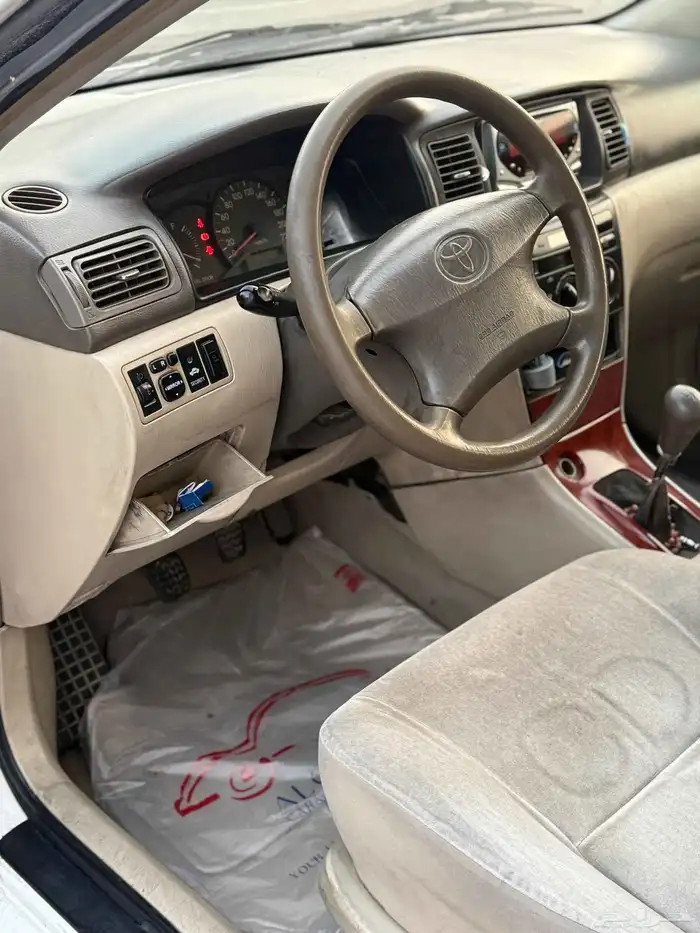 تويوتا كورولا 2004 جير عادي زجاج كهربا نضيفه جدا 8