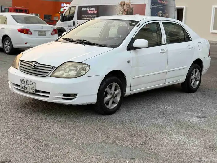 تويوتا كورولا 2004 جير عادي زجاج كهربا نضيفه جدا 2