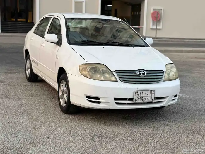 تويوتا كورولا 2004 جير عادي زجاج كهربا نضيفه جدا 1