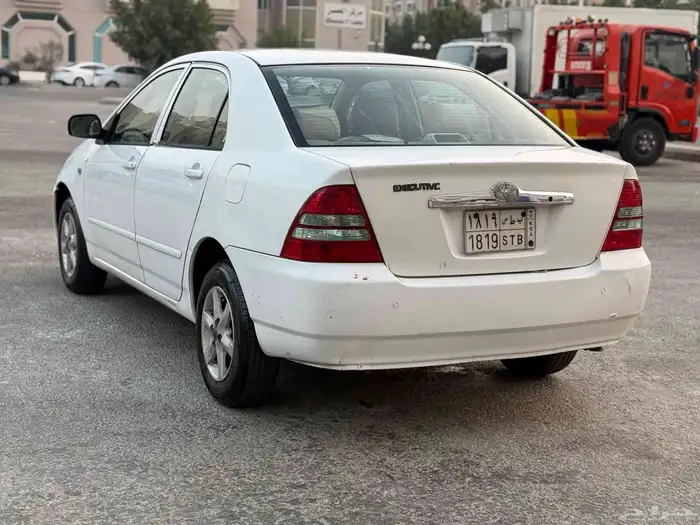 تويوتا كورولا 2004 جير عادي زجاج كهربا نضيفه جدا 4