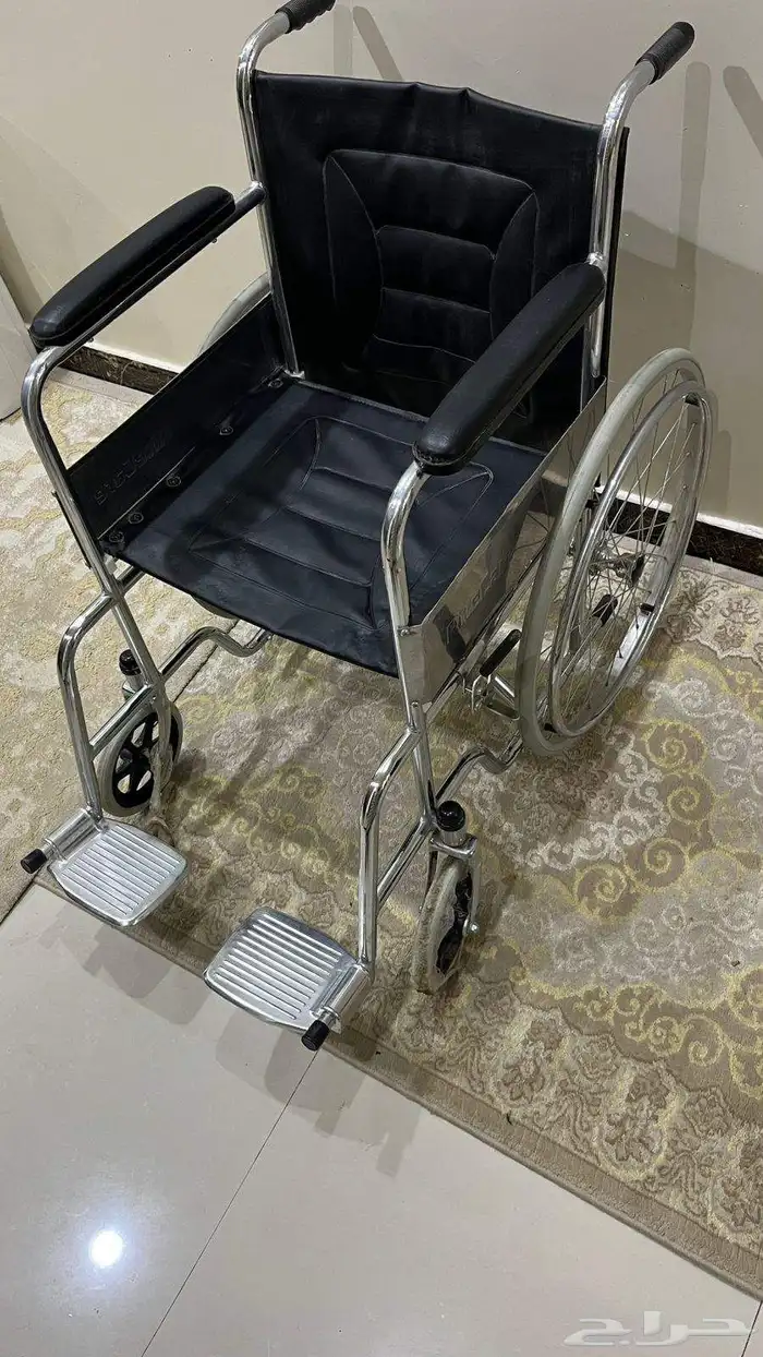 كرسي متحرك عربية. 0