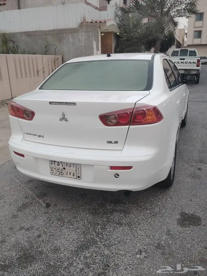 سيارة ميتسوبيشي لانسر موديل 2009للبيع الممشى 3500ألف 7