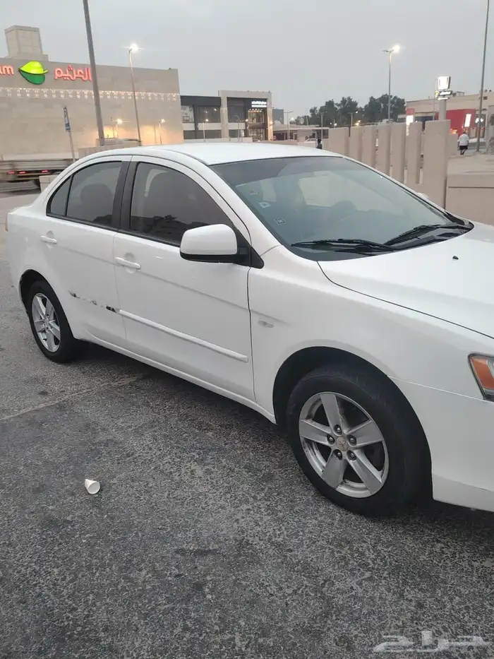 سيارة ميتسوبيشي لانسر موديل 2009للبيع الممشى 3500ألف 6