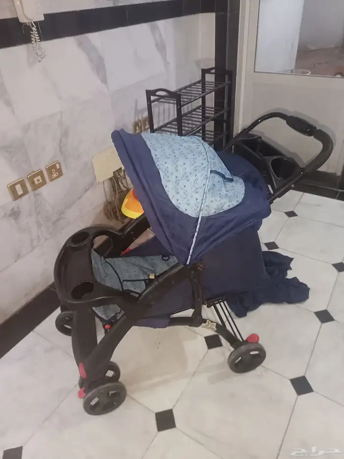 عربه اطفال بحاله جيده وجزمه من اي كيه بحاله جيده عربه اطفال 5