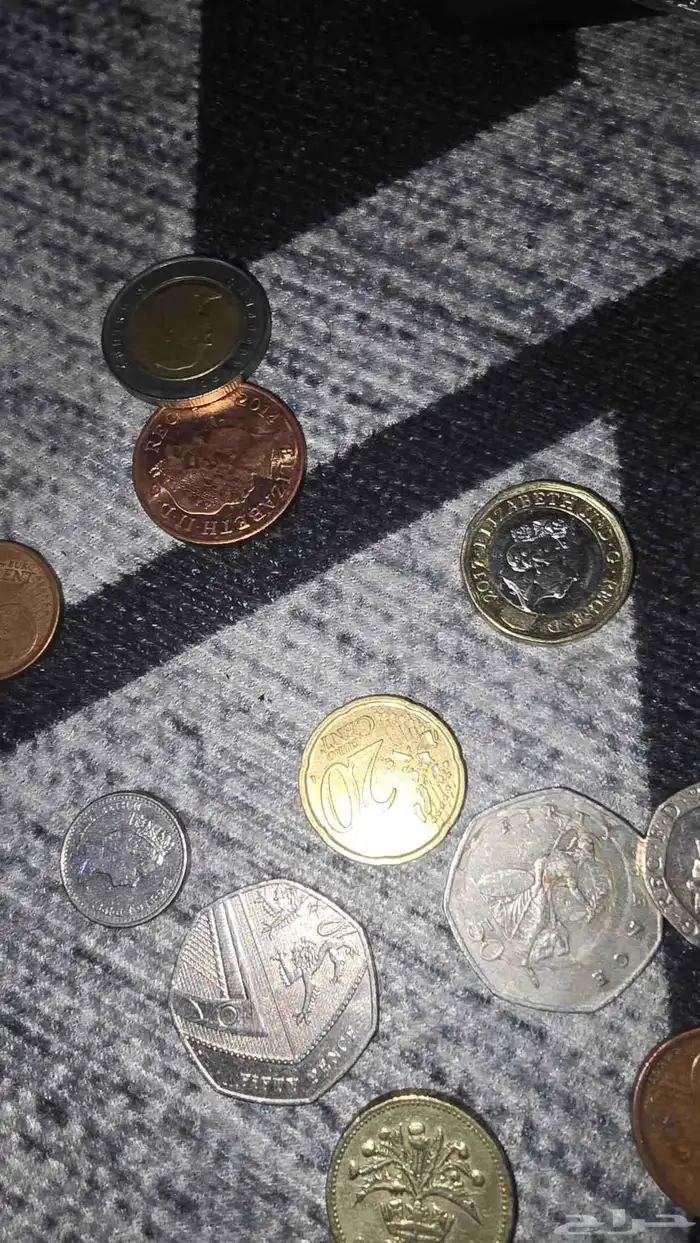 عملات متنوعة منها القديم والجديد حوالي 200 عملة او اكثر 2