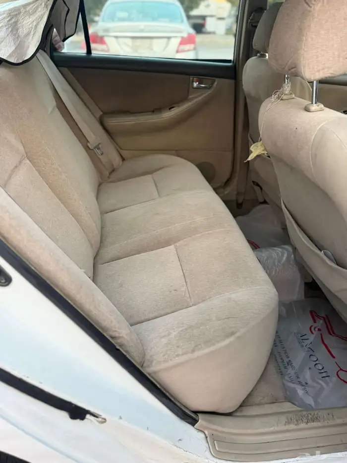 تويوتا كورولا 2004 جير عادي زجاج كهربا 8