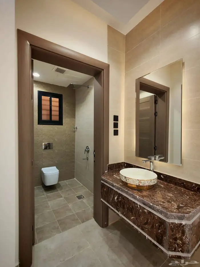 للبيع بحي الضيافه شقه تمليك علوي ب 520 الف بسطح خاص ومصعد 12