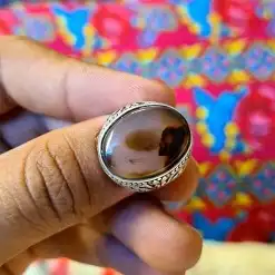 خاتم فضه مع عقيق يماني مصور شكل رجل يخرج دخان من فمه 1