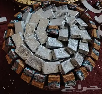 معلم تغليف شوكلت ورق وسلفان ومعلم رص صواني 1