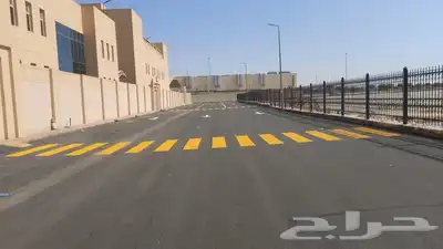 تخطيط دهانات طرق ومواقف السيارات ومحطات الوقود ورسم المعاقين 13