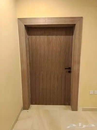 تفصيل ابواب خشب جديد و ديكور خشب جدران 1