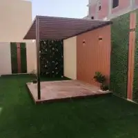 تنسيق حدائق عشب صناعي شلالات مظلات ديكورات جازان صامطه صبيا 4