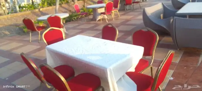 تاجير كراسي شفاف وطاولات قزاز وكراسي احمر ملبس 0