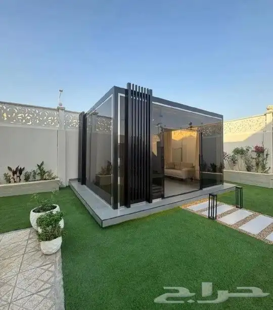 النجيل الصناعيه مع بديل الخشب والمظلات والنوافير والشلالات و 8