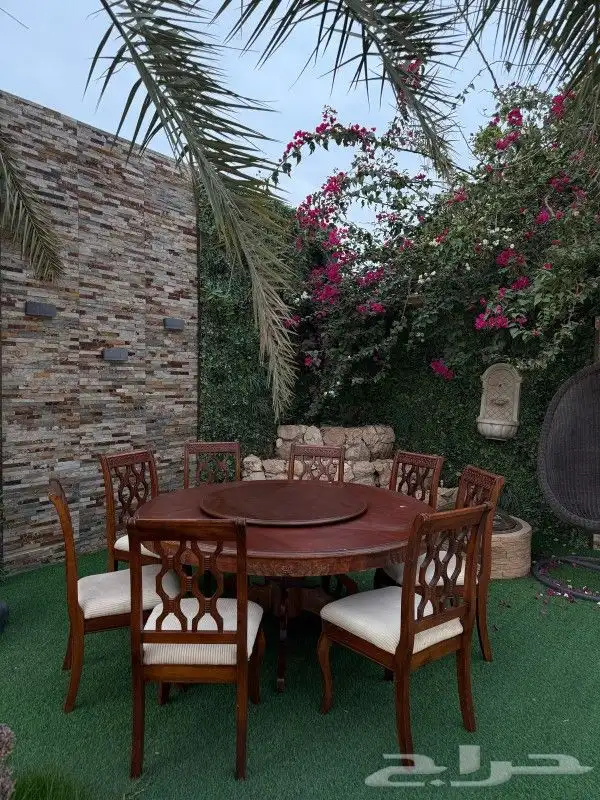 طاولة طعام خشبية دائرية مع 8 كراسي 2