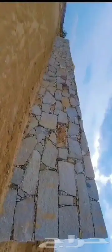 بكلين لبناء الثمايل الحجر وقص الاراضي وتسوية المزارع 1