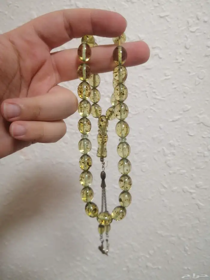 سبحة كهرمان حشري حبة زيتونه (جديدة). 1
