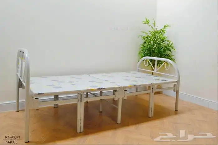 سرير بجودة عالية  مصف ح بطبقة خشب أنيقة ومتانة ممتازة.   ت 3
