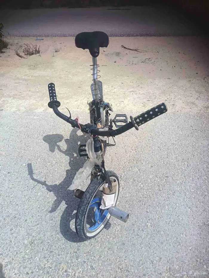 سيكل فراشه مرشوش ابيض ازرق مقاس 16 على اسوم 1