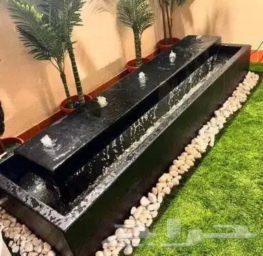 تنسيق حدائق وتركيب العشب الصناعي 5